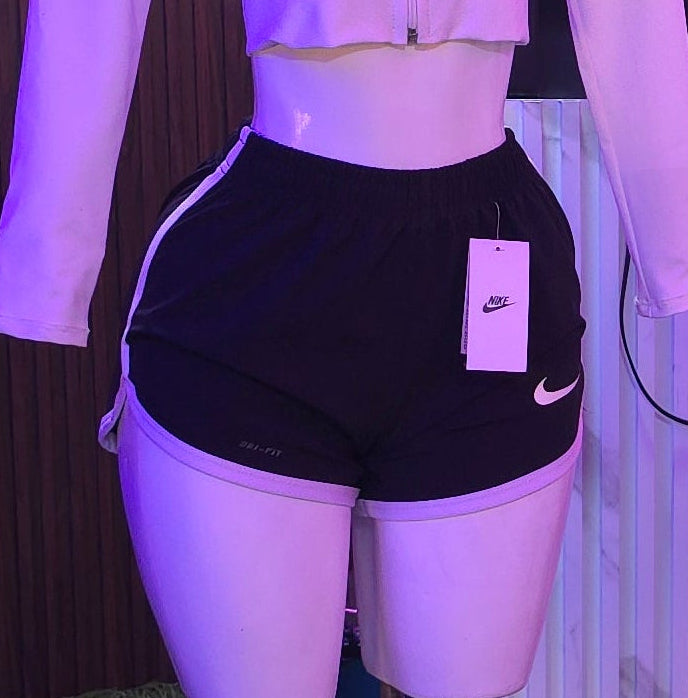 SHORT RUNNING / NIKE / DAMA